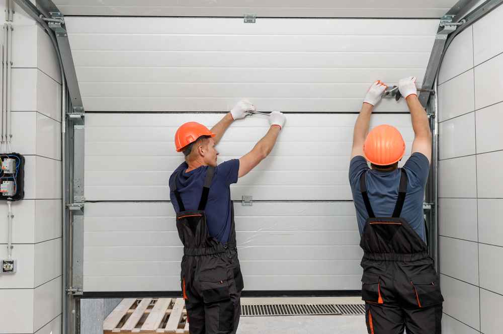 Pourquoi faire appel à une entreprise alsacienne pour installer une porte de garage dans le Haut-Rhin ?